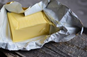 “Closeup of an open butter ready for measurement”